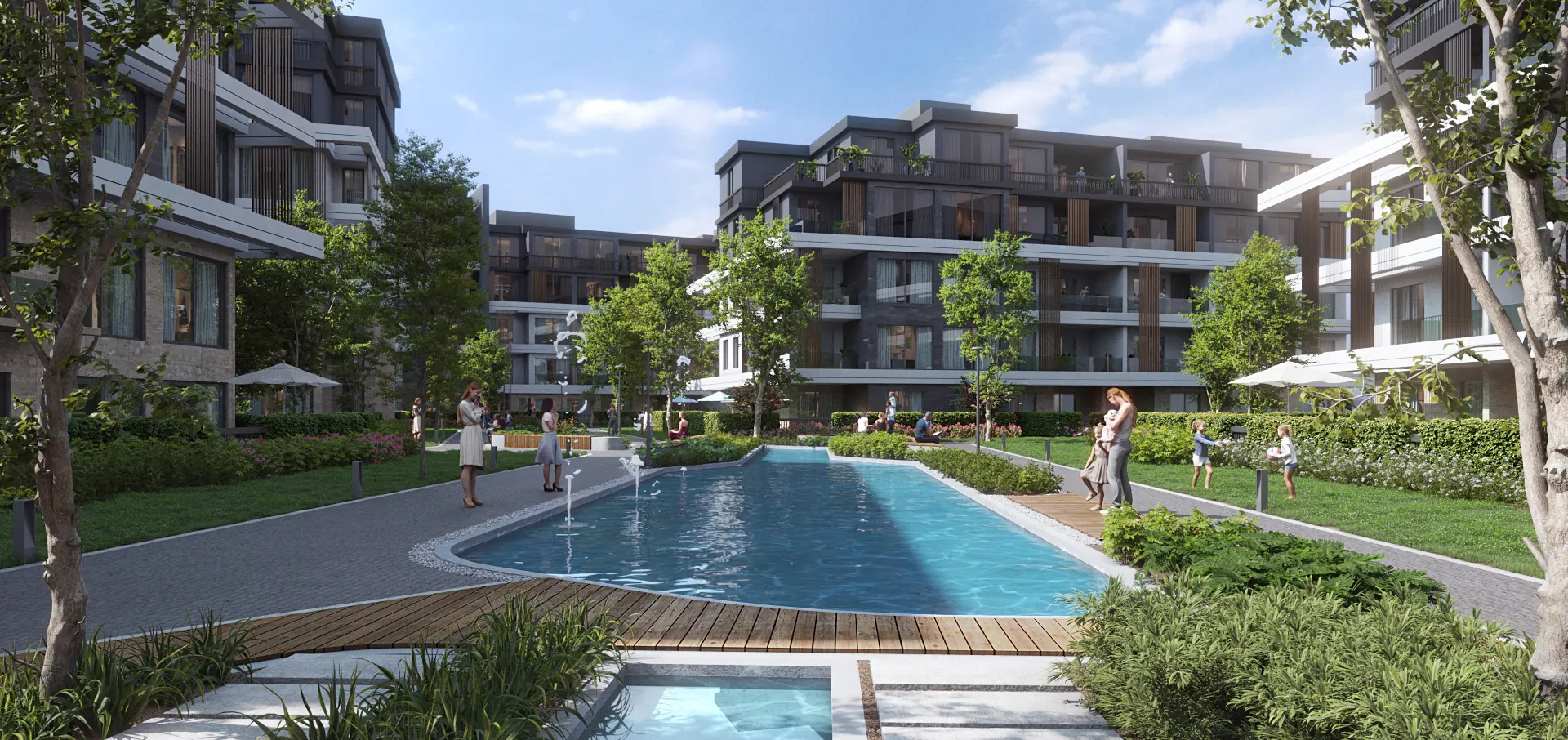 Swimming pool with fountains between residential buildings and gardens in U.Nurai