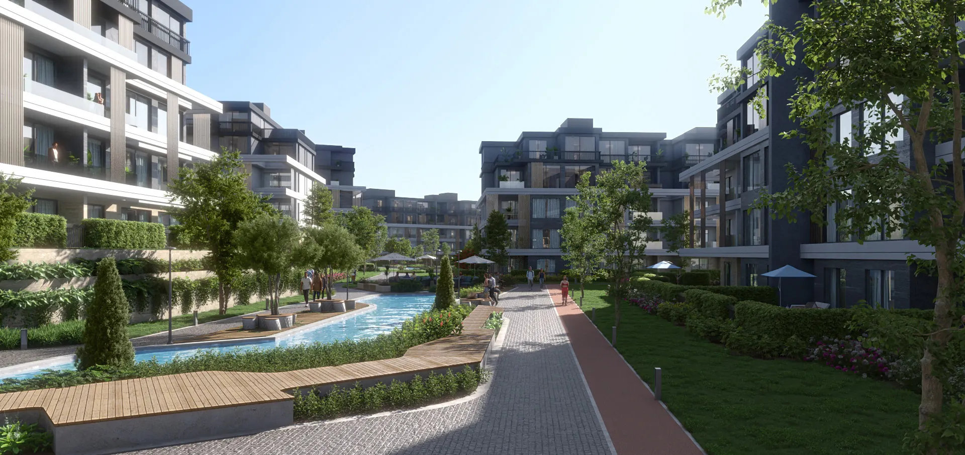 Water channel and landscaped walkway between the residential buildings of U.Nurai
