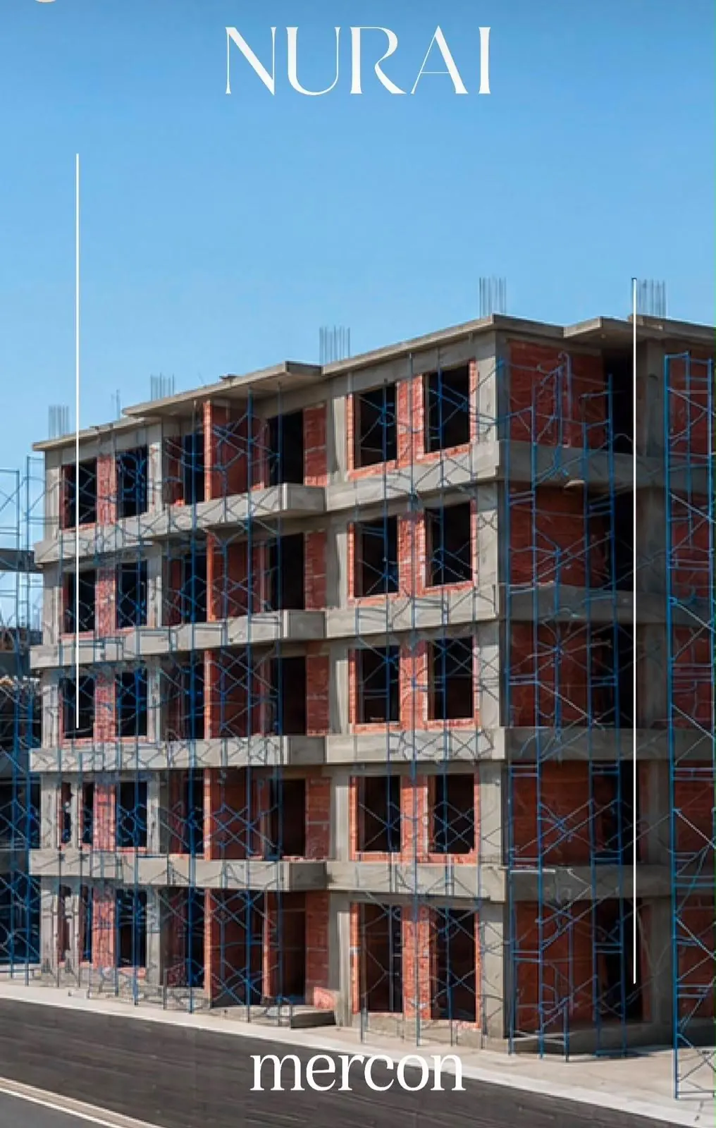 Residential building under construction with brick walls and scaffolding